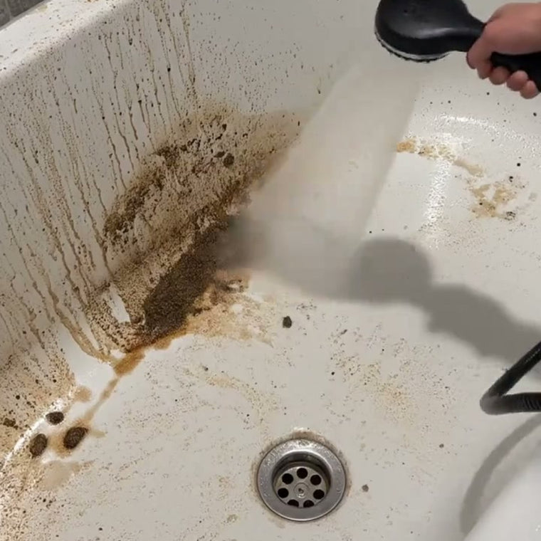 Scrubbing the tub on your knees